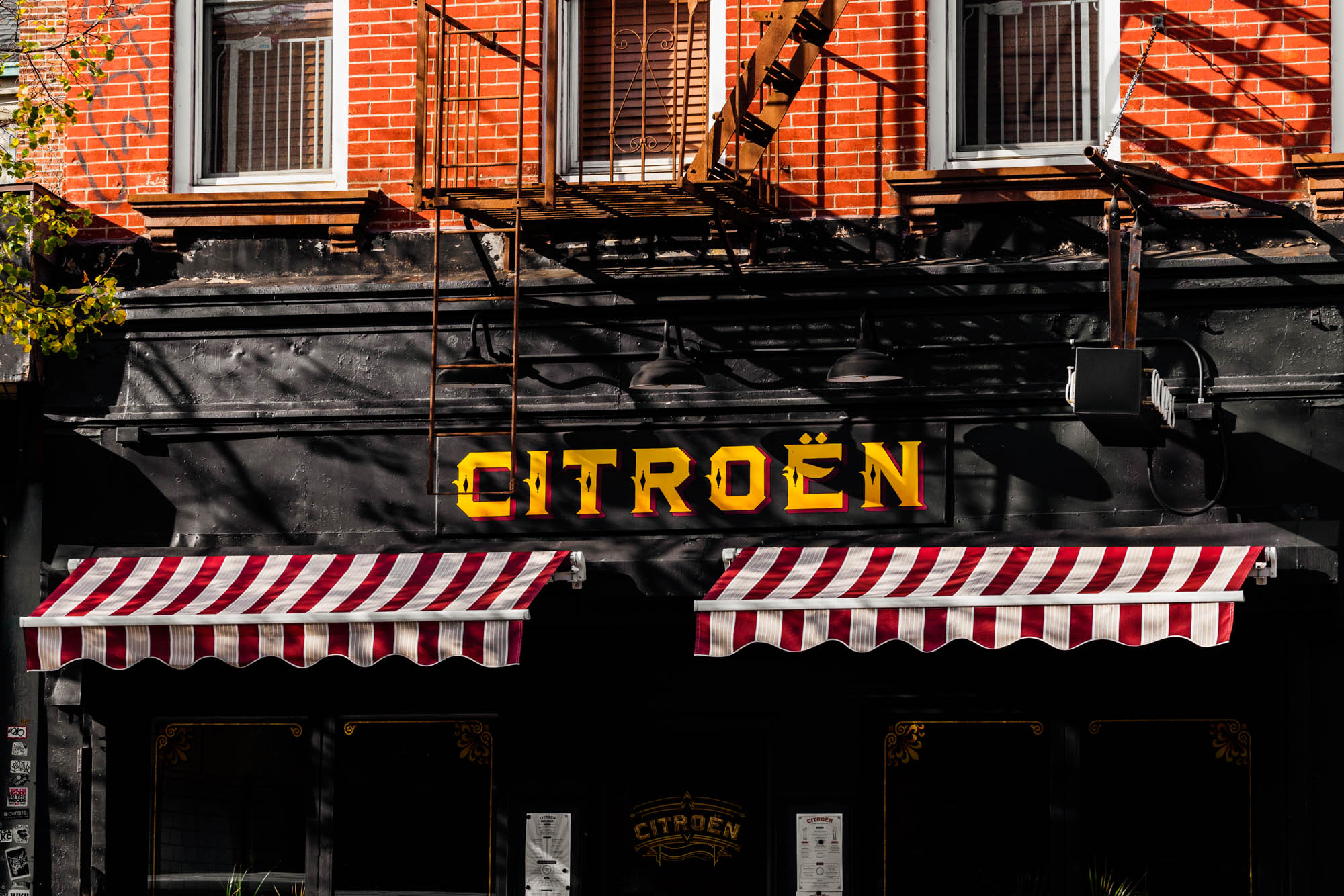 The exterior of Citroën, a french restaurant in Greenpoint Landing near Two Blue Slip apartments.