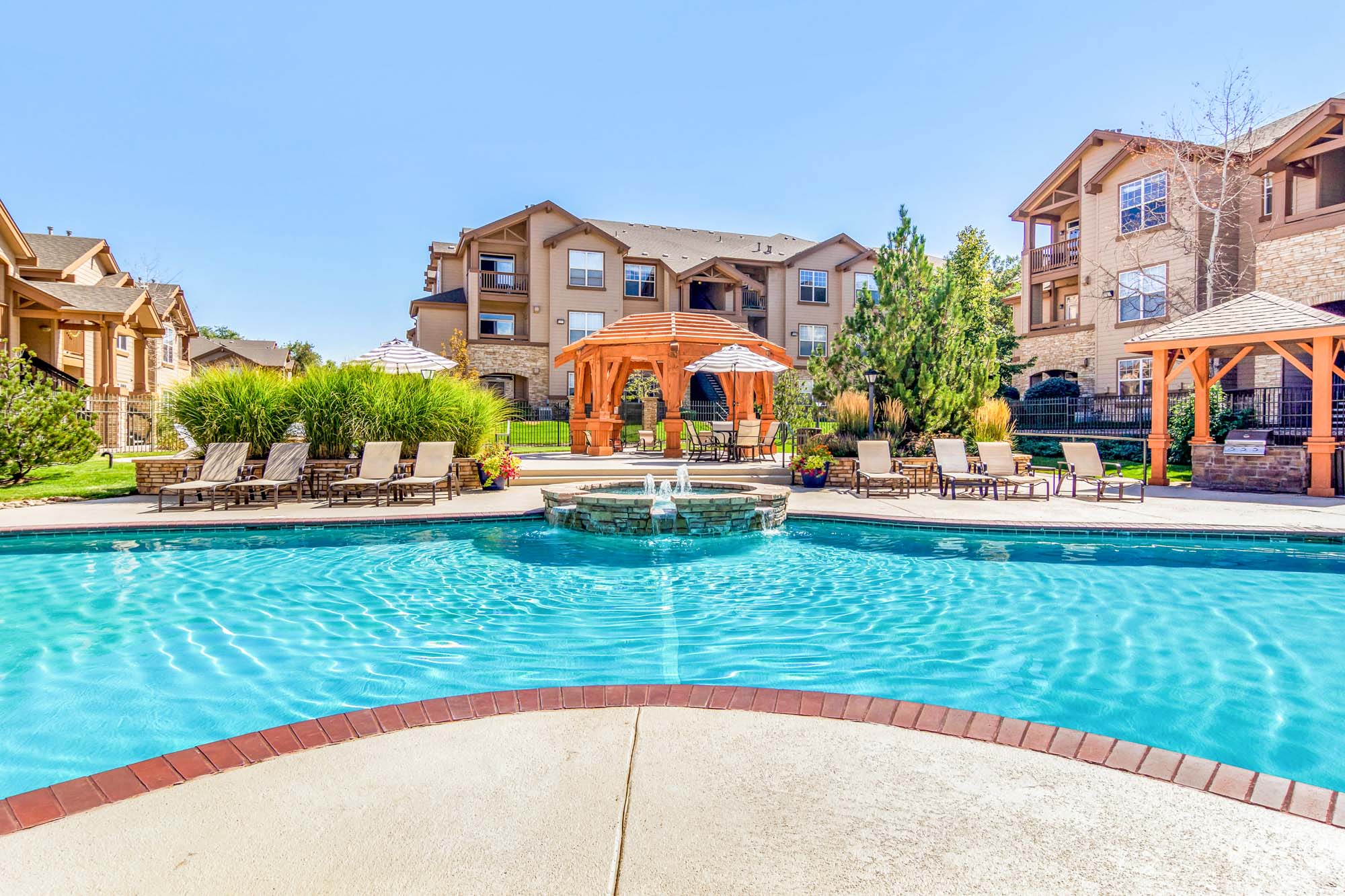 The pool at The Village at Legacy Ridge apartments near Denver, CO.