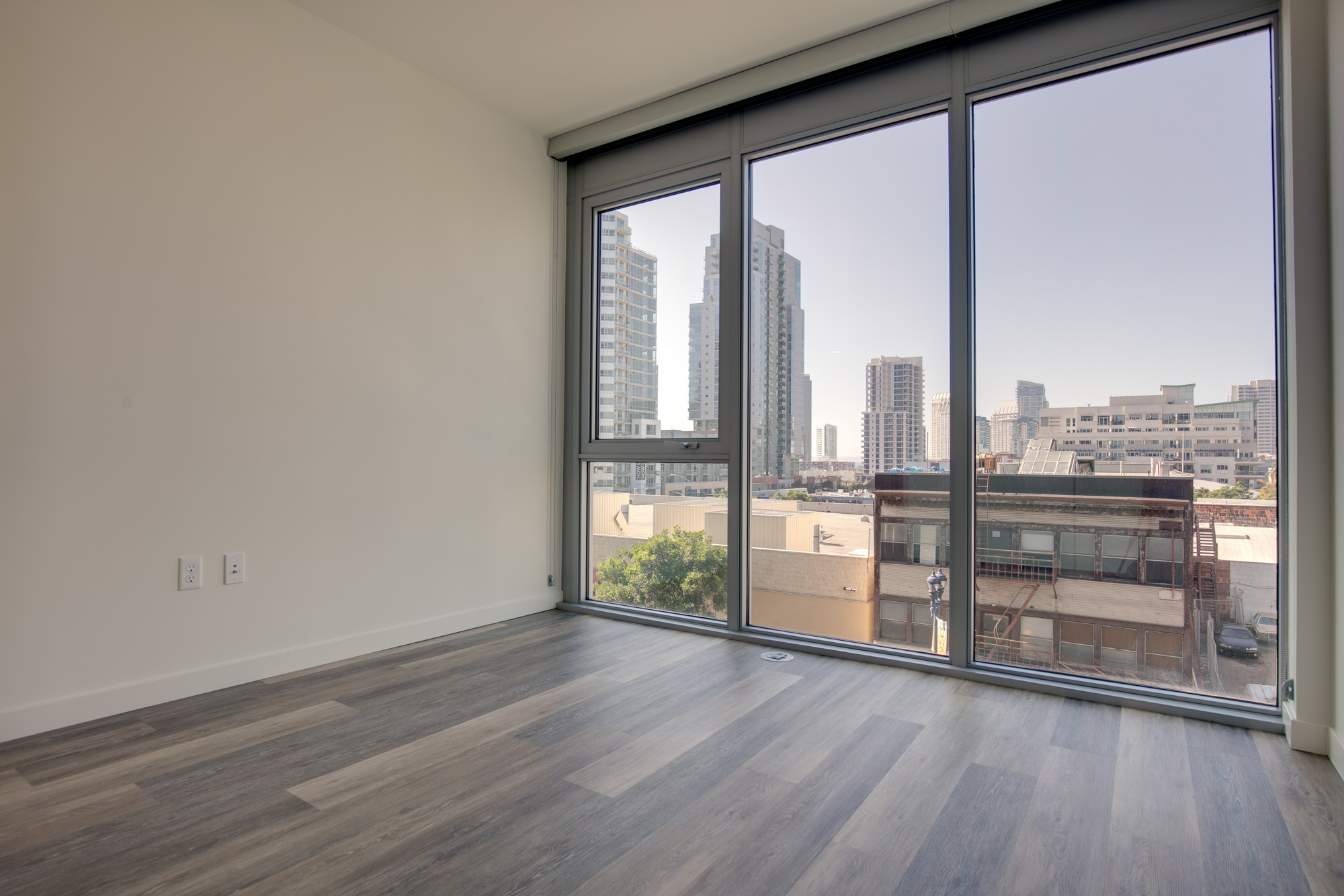 Bedroom space at The Merian Apartments in San Diego, California.