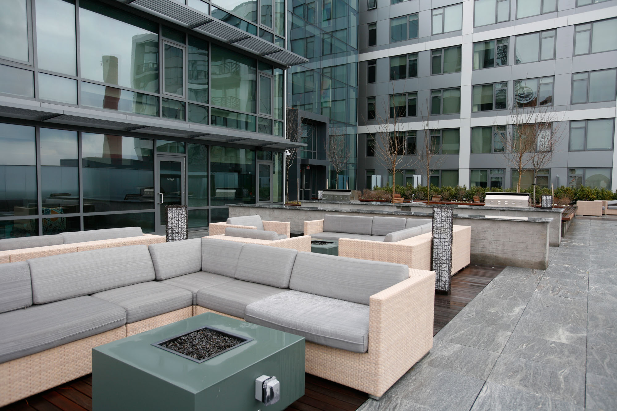 The outdoor terrace with lounges and fire pits at Twelve12 in Navy Yard, Washington DC.