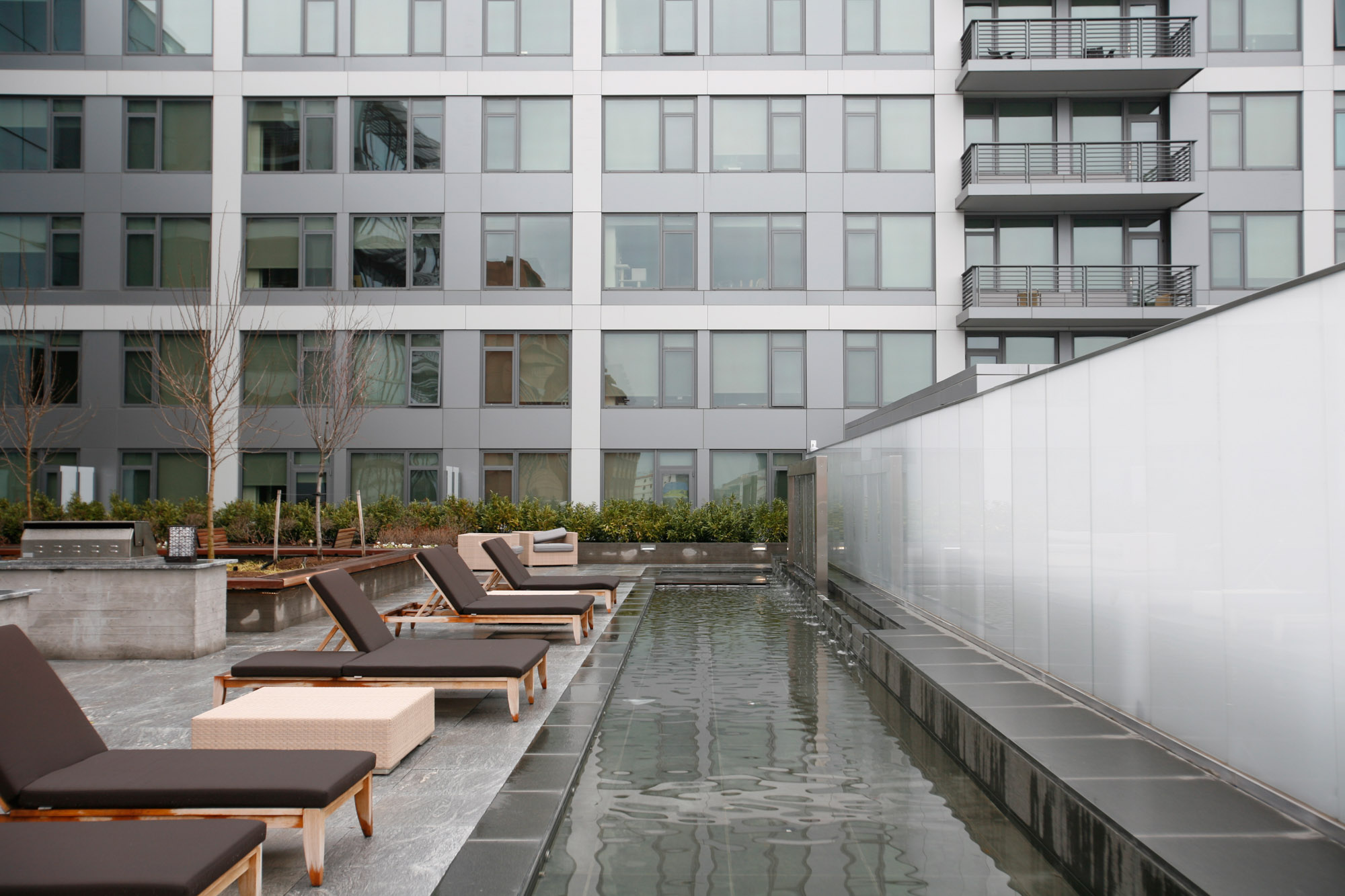 The outdoor terrace with water feature at Twelve12 in Navy Yard, Washington DC.