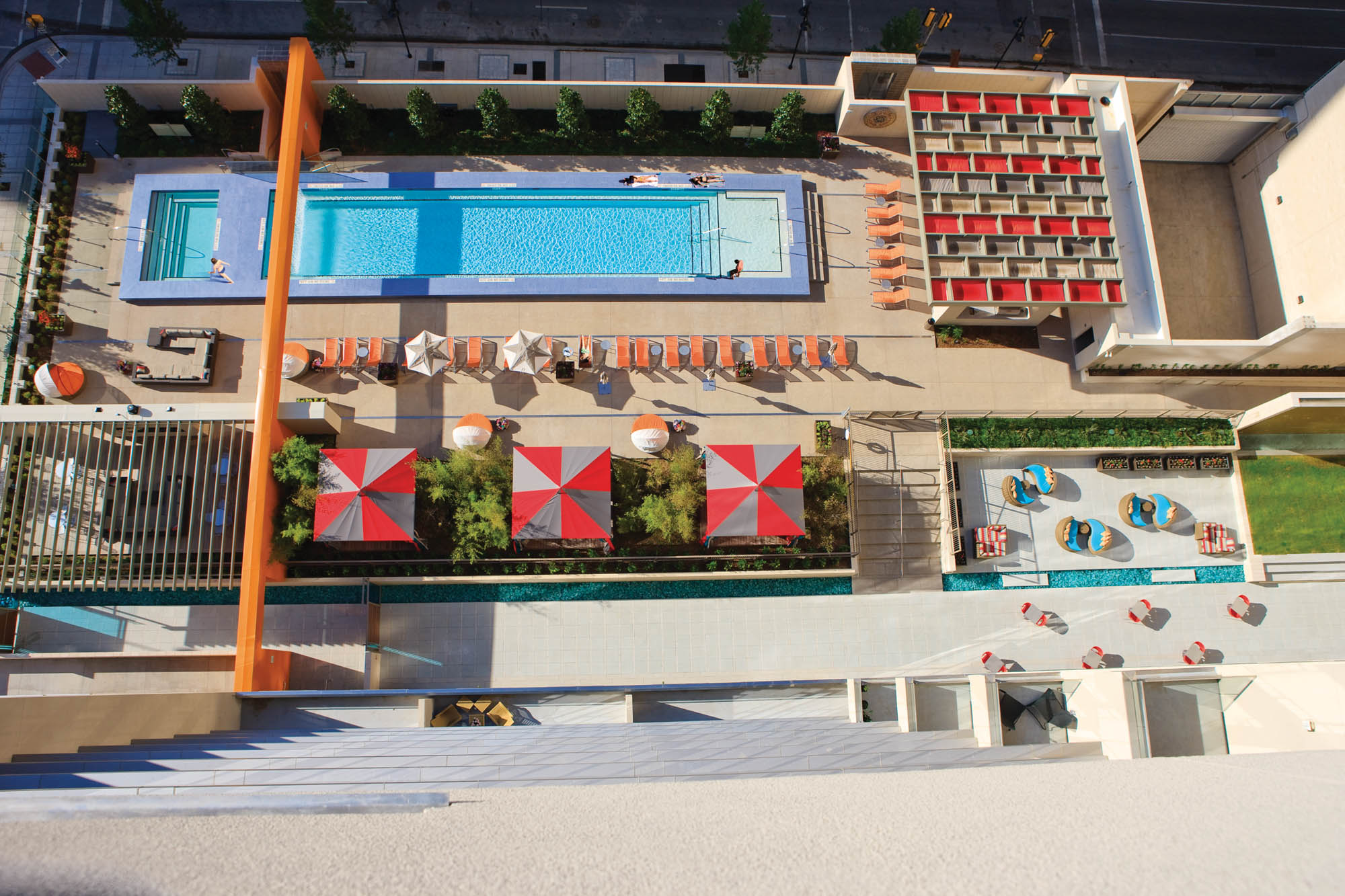 Aerial pool view at The Merc apartments in Mercantile Place in Dallas, TX