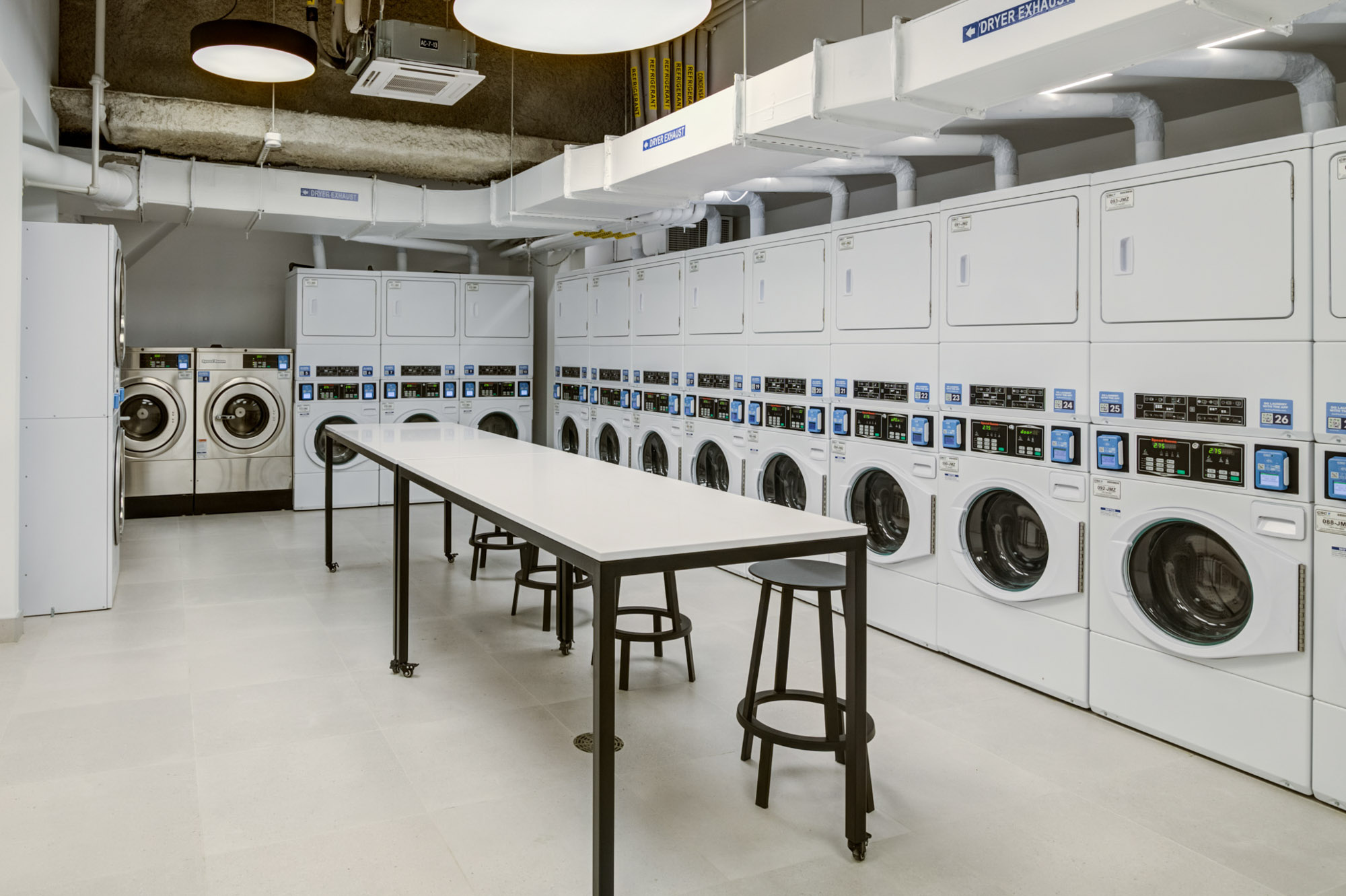 The laundry room at The Olivia in Manhattan, NYC.